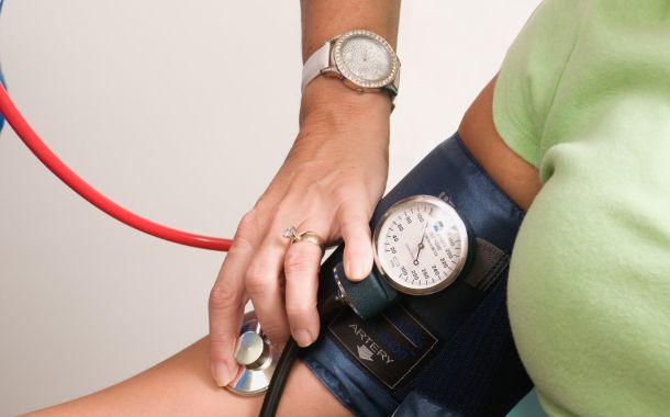 Nurse taking blood pressure